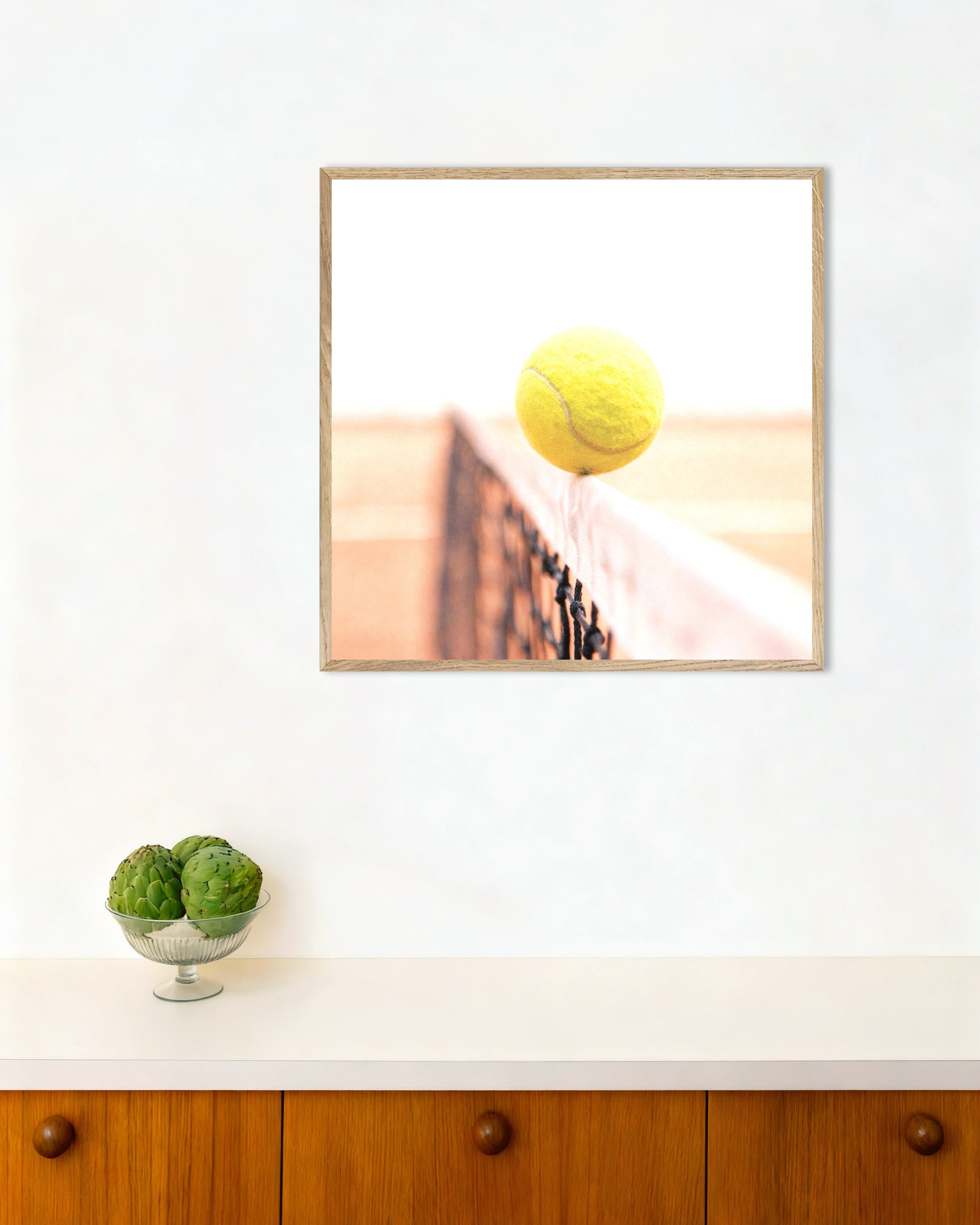 Poster of Tennis ball on net poster – minimal sports photography print, with natural wooden frame